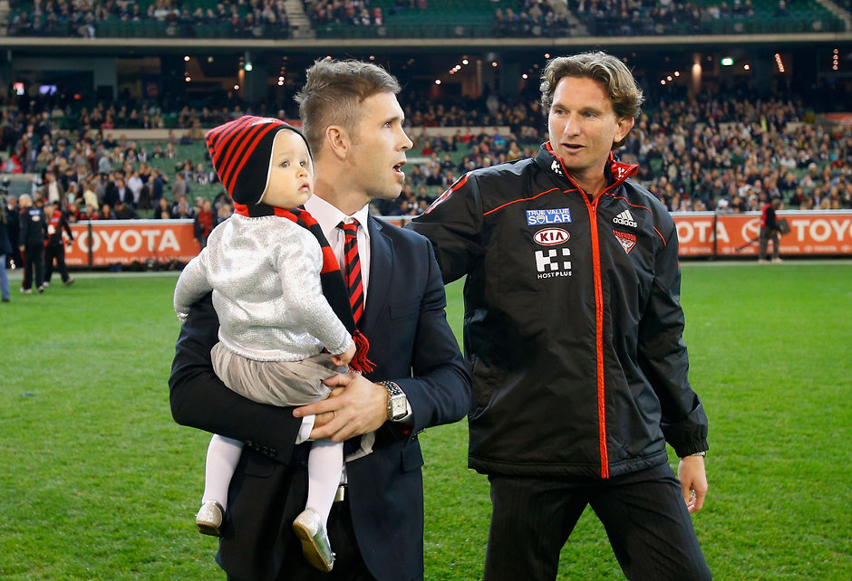 AFL 2012 Rd 23 - Essendon v Collingwood Mark McVeigh with former coach James Hird in 2012 - ${keywords}